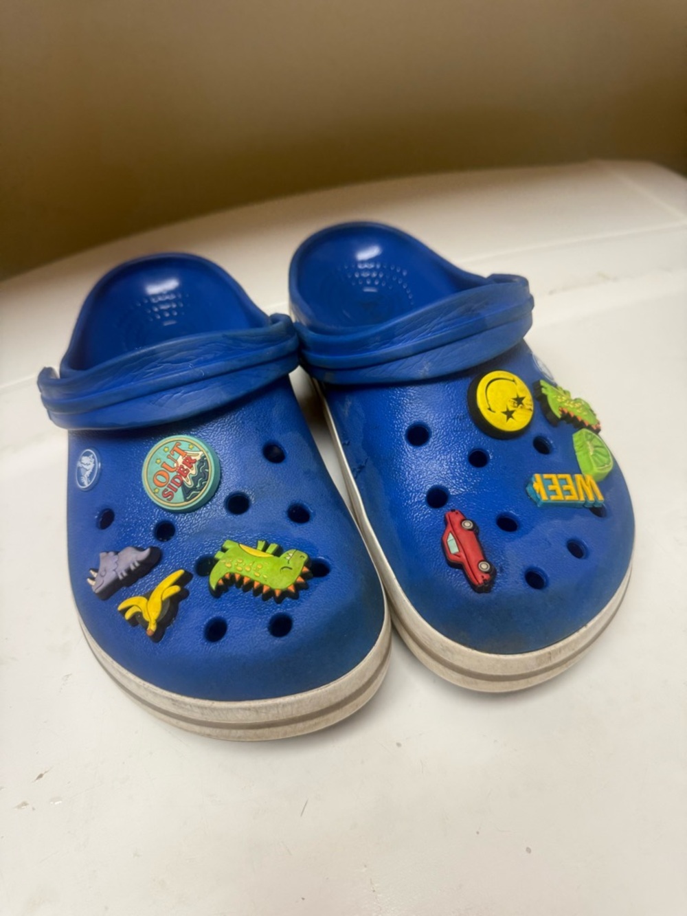CROCS Kids Blue Clogs with Playful Charms